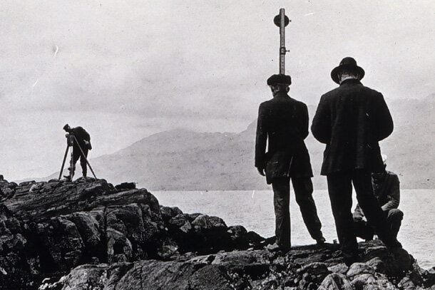 work party calibrating a tide staff