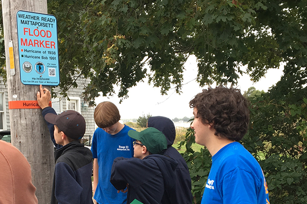 [Photo] Boy Scout Troop puts up flood marker signs