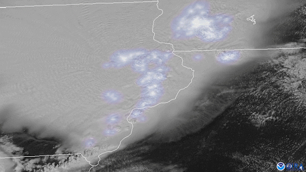 ANimated gif of satellite IR images of clouds combined with lighting detections during a derech across the Midwest in August 2020