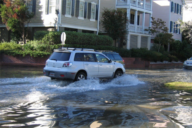 SUV navigates nuisance flood