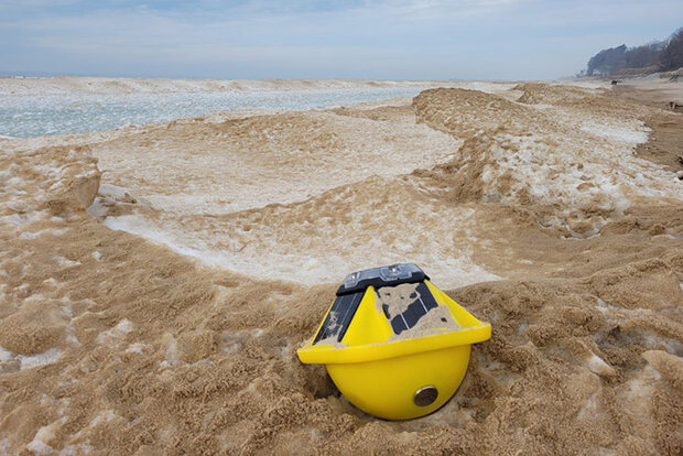Buoy on sandy ice
