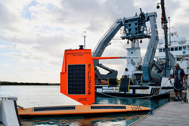 Saildrone in front of ship