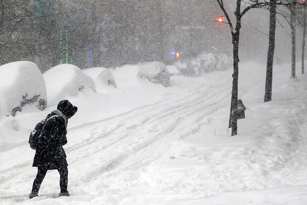 Person walking in snowstorm