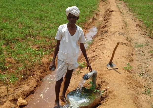 Farmer at tube well