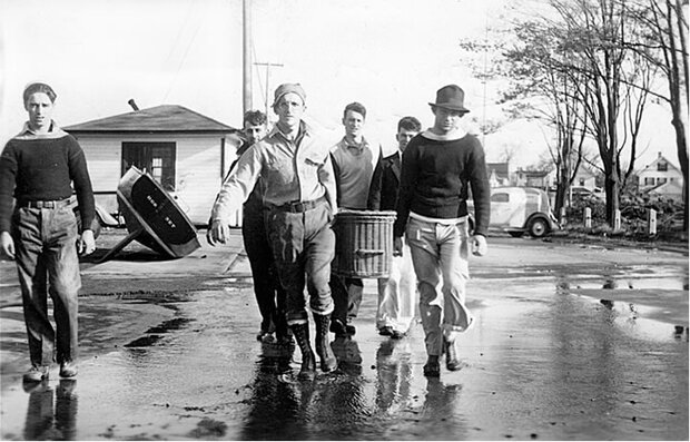 Fishermen carrying basket