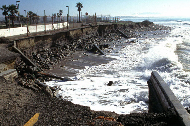 A washed out section of beach front road